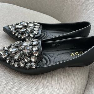 Cute leather flat shoes .